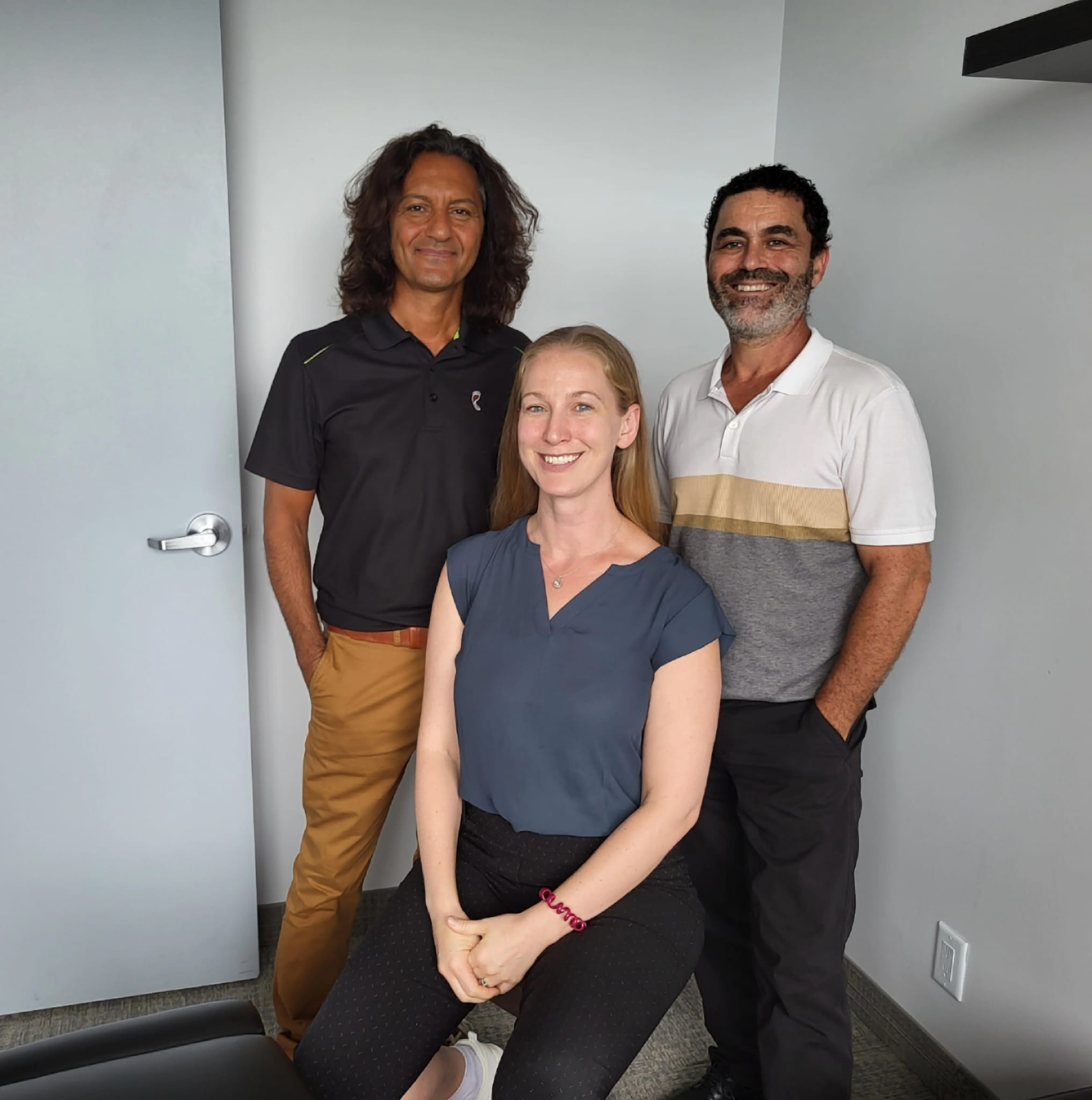 Dr. Mark Halpern, Dr. Lauren Stethem, and Dr. Touraj Najafian — Midtown Family Chiropractic Centre